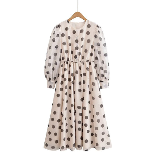 Mono con falda larga, estampado de lunares, cuello redondo, mangas abullonadas y cintura fruncida