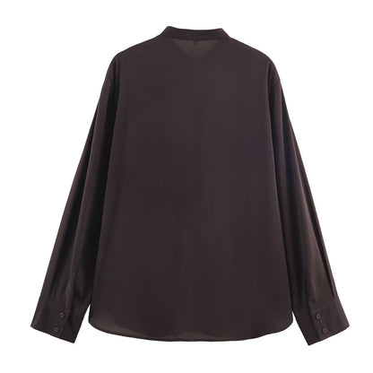 Blusa de manga larga con cuello volante colgante
