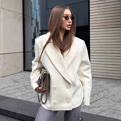 Blazer largo de lana beige de doble botonadura y corte holgado
