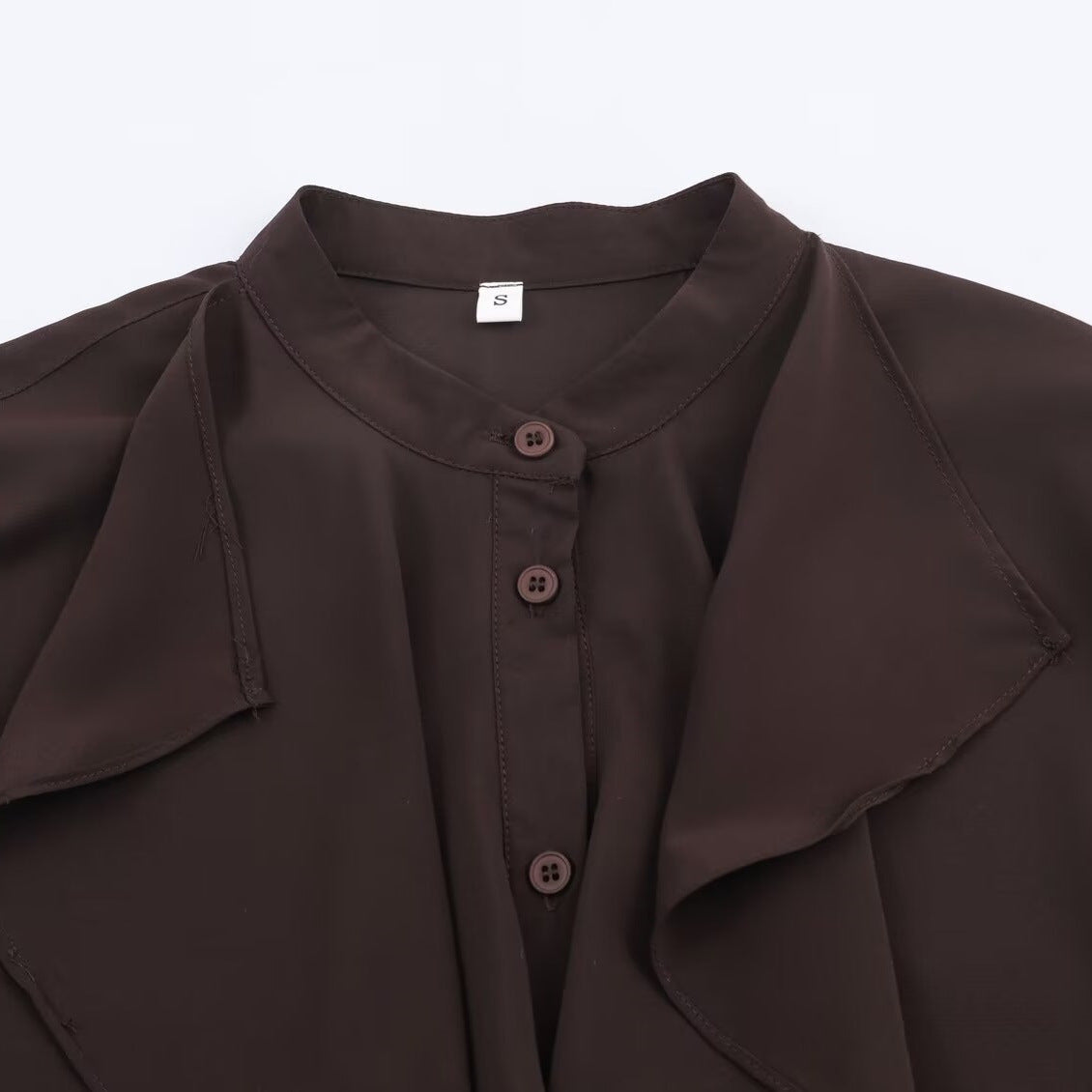 Blusa de manga larga con cuello volante colgante