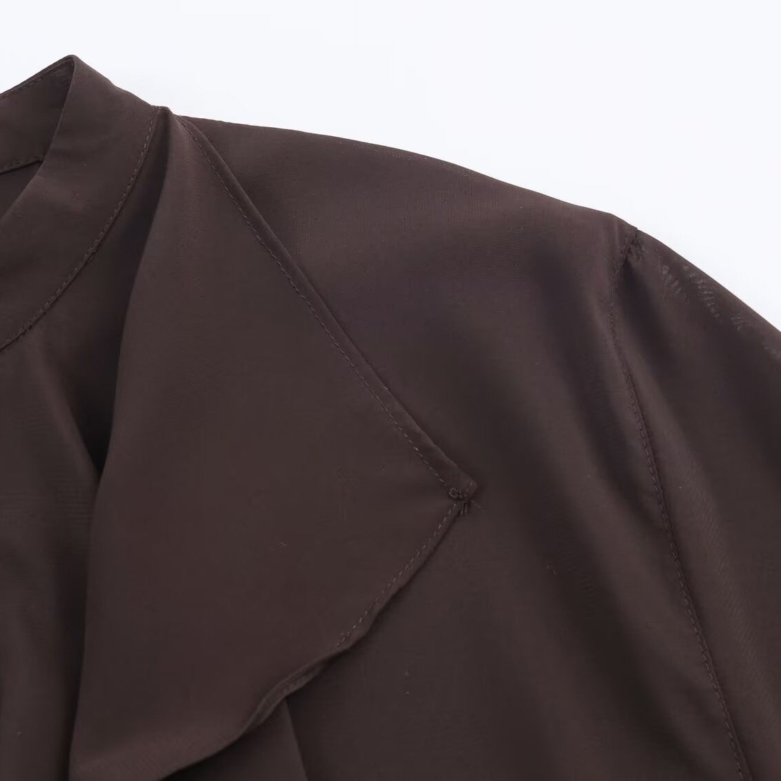 Blusa de manga larga con cuello volante colgante