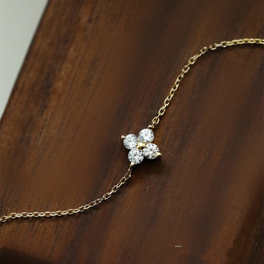 Pulsera mini de plata de ley 925 con flor y zircón chapada en oro